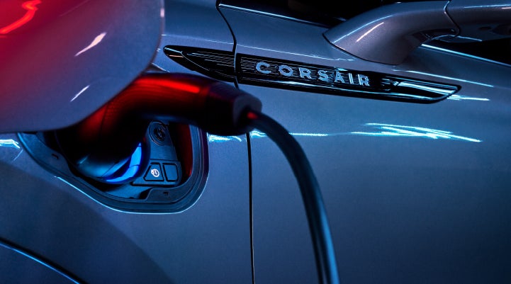A charger plugged into the charging port of a 2024 Lincoln Corsair® Plug-in Hybrid model. | McKie Lincoln, Inc. in Rapid City SD